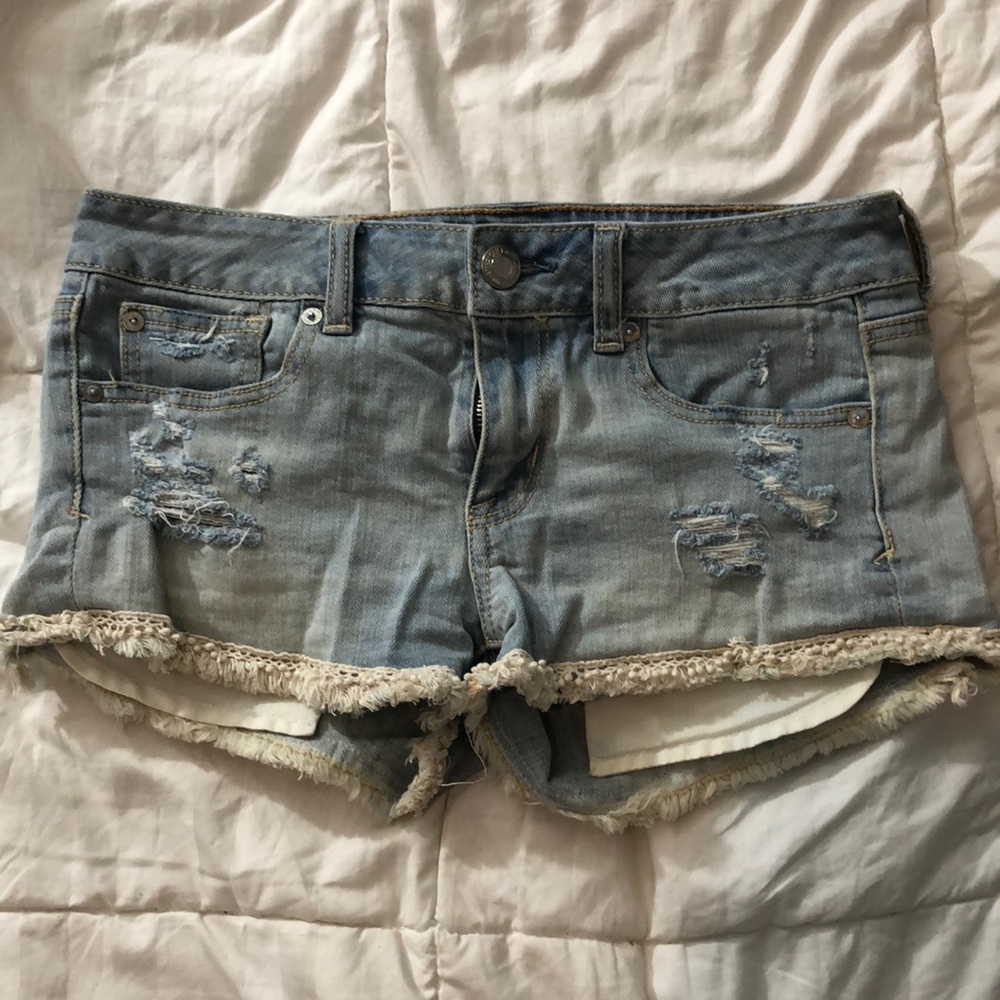 Hollister light wash jean shorts with white frills
